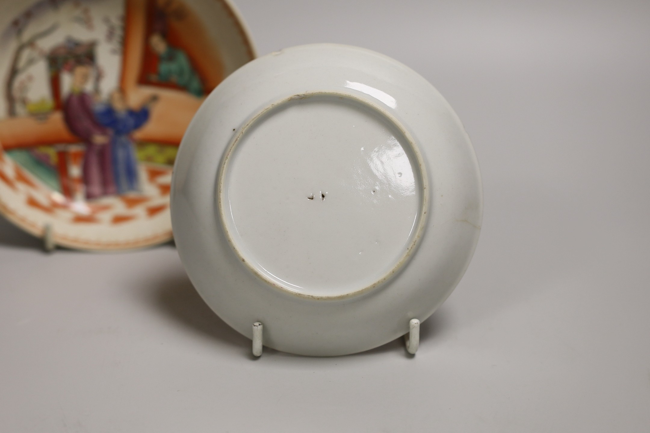 An 18th century Worcester porcelain coffee cup, a later saucer and a Chinese saucer, cup 6.5cms high